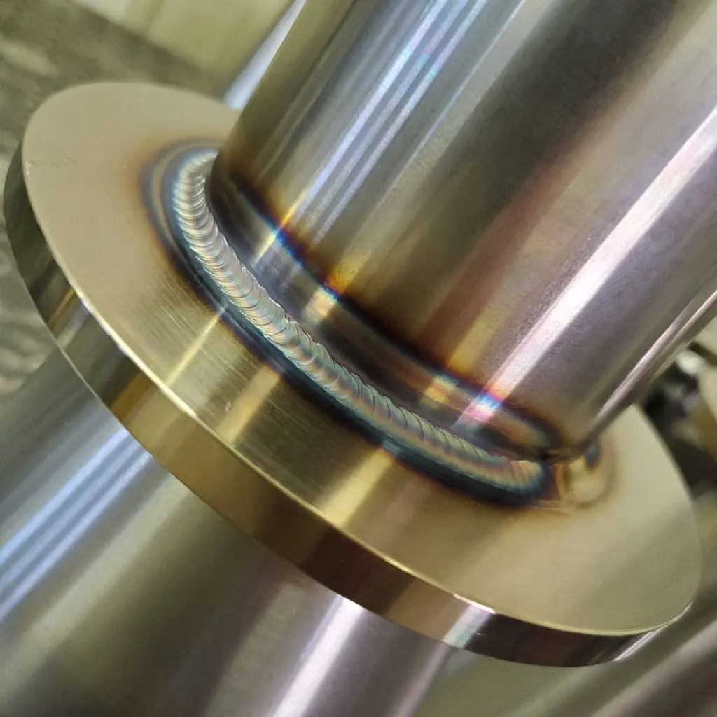 Closeup of welding of metal cylinders