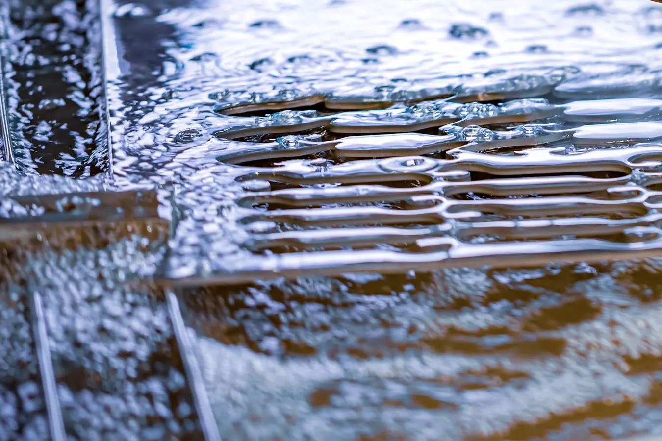 Replacement Parts being cut from sheet of steel on the water jet