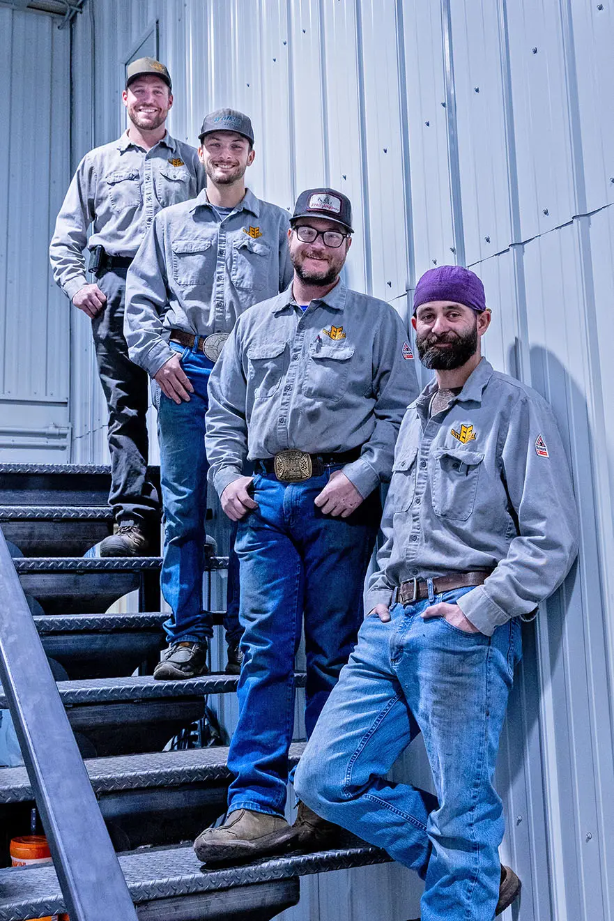 The Elite Fabz Team Posing on Stairs - Professional Welders and Fabricators